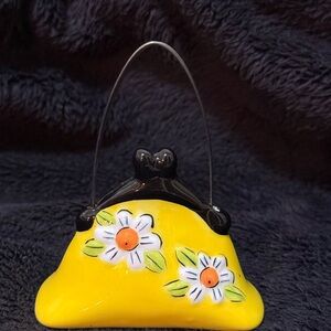 Floral yellow miniature porcelain handbag.